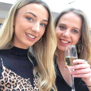 Two women enjoying brighton's best Bottomless Brunch at Redroaster