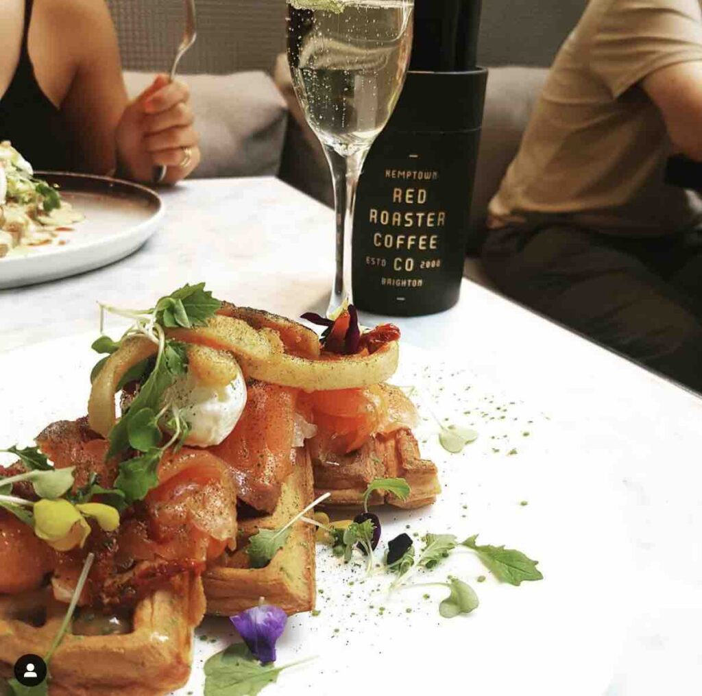 This is an image of people doing bottomless brunch in brighton red rooster